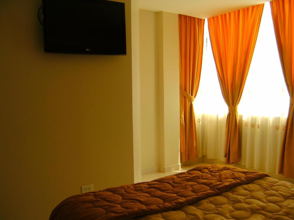 Hostal Fevilamir Ibarra Rum bild