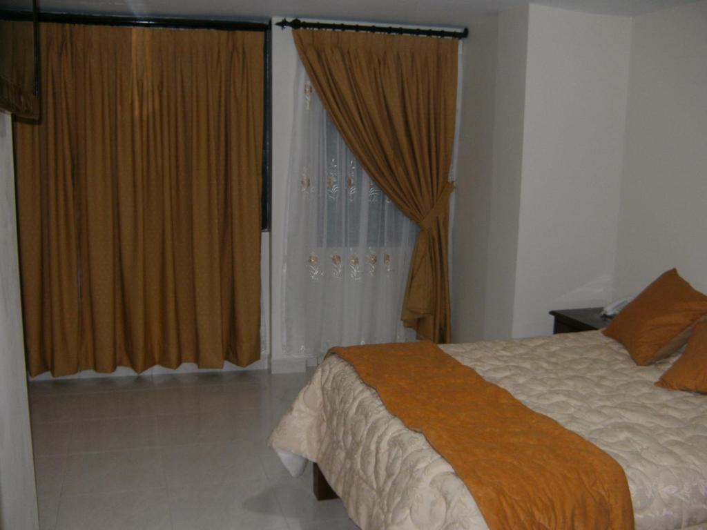 Hostal Fevilamir Ibarra Rum bild